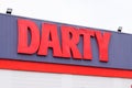 Darty logo and text sign on store facade high tech french shop