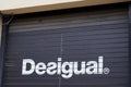 Desigual logo brand and text sign of shop on spanish store clothing facade