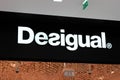 desigual logo brand and text sign wall shop on spanish store clothing facade