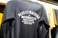 Deus logo brand and sign on sweat shirt from cap ferret France fashion clothes