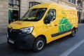 DHL delivery panel van yellow master renault car courier logistic truck in city with