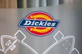 Dickies logo brand and sign text on facade windows store wall for us fashion boutique