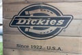 Dickies logo brand and sign text on facade wooden store wall for us fashion boutique