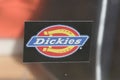 Dickies logo brand and sign text on windows store wall for us fashion boutique