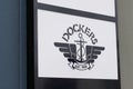 Dockers shop sign brand and text on boutique Apparel fashion store logo work wear