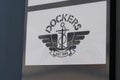 Dockers shop and text sign boutique apparel Store logo of fashion work wear
