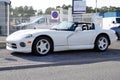 Dodge Viper SRT 10 car white parked front of dealership super sports vehicles