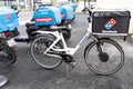 Dominos pizza brand logo and text sign on bicycle bag case delivery bike for