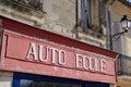 Driving school old signage in french text auto ecole vintage ancient on building facade
