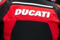 Ducati logo sign and brand text of italian motorcycle manufactured on rear jacket