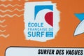 Ecole francaise de surf french surf school brand logo text sign on office windows