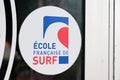 Ecole francaise de surf french surf school logo text with brand sign on surfing shop
