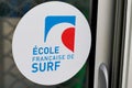 Ecole francaise de surf french surf school logo text with brand sign on entrance