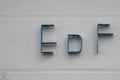 EDF sign logo and brand text on building facade of French multinational electric Royalty Free Stock Photo