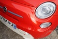 Bordeaux , Aquitaine / France - 11 19 2019 : Electric 500 Fiat 500e headlight front vintage modern electric red italian car