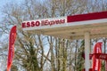 Esso Express gas station pumps logo text and brand sign