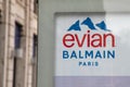 Evian Natural Mineral Water logo text and Balmain paris sign brand in french