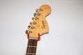 Fender squier strat Guitar brand logo and text sign electric guitar head detail Royalty Free Stock Photo