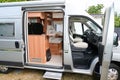 Fiat ducato campereve brand RV holiday grey motorhome with slide side door open in