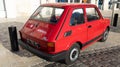 Fiat 126 red vintage model old timer car in street parked Royalty Free Stock Photo