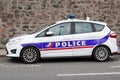 ford c-max car with sign and symbol of French national police parked in city street