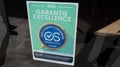 Garantie excellence logo sign and brand text opinion system label company
