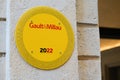 Gault & Millau 2022 logo brand and yellow text sign of classic influential French