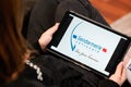 Bordeaux , Aquitaine / France - 11 30 2019 : gendarmerie french police sign logo screen tablet hands young woman in home sofa