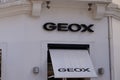 Geox sign text store and shop logo of Italian shoes and clothing brand footwear wall