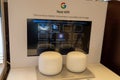 Google home nest wifi mini virtual voice assistant on display commercial brand shop