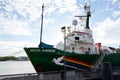 Greenpeace Arctic Sunrise green boat logo and text sign on ship