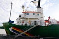 Greenpeace green boat logo and sign on ship Arctic Sunrise