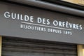 Guilde des orfevres logo brand fashion shop and text sign store on facade boutique in