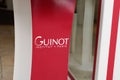 Guinot paris french shop cosmetics brand text perfume red logo sign store