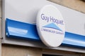 Guy hoquet logo and text sign office on real estate french agency