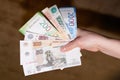 Hand holding flat money russian ruble banknotes currency cash paper note business and