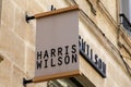 harris wilson logo brand and text sign front wall facade chain clothing and