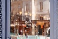 Hermes logo and sign text front of boutique of French high fashion luxury goods