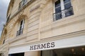 HermÃÂ¨s logo and text sign of french high fashion luxury goods manufacturer