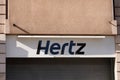 Hertz logo brand and text sign on facade office American car rental company Royalty Free Stock Photo