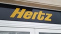 hertz text sign and logo of car rental service Royalty Free Stock Photo