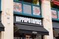 Hippopotamus facade restaurant logo brand and text sign of french steak house chain
