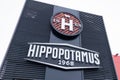 Hippopotamus restaurant brand logo and sign text front of entrance specialist in beef