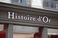 histoire d\'or logo facade and text boutique shop commercial wall sign in the street