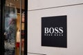 Hugo Boss brand logo shop and texr sign store entrance German luxury fashion