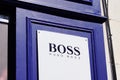 Hugo Boss logo text and brand sign on facade store German luxury fashion style house