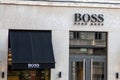 Hugo Boss shop sign text wall facade and logo brand front chain of store of men boys Royalty Free Stock Photo