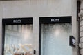 Hugo Boss store brand logo and text sign wall facade of German boutique chain of