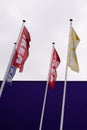 Ikea sign brand shop and text logo on waving flags colorful