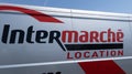 Intermarche location sign logo on panel side van rental trucks front of hypermarket Royalty Free Stock Photo